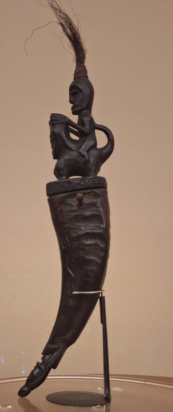 Plate 2 — a buffalo-horn naga morsarang with a single rider on the singa and a black ijuk plume